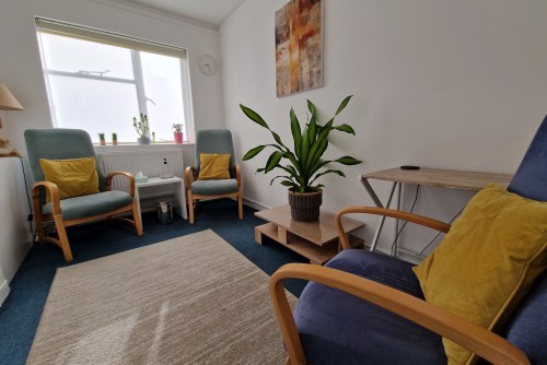 Anxiety Therapy in Hackney, E8 1 Calm, light-filled therapy room with two armchairs in a Hackney counselling practice.